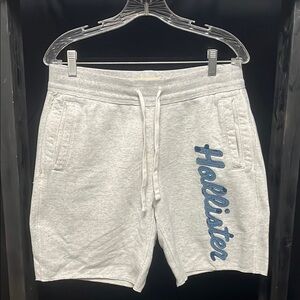 Hollister Men's Light Gray Athletic Shorts with Blue Logo